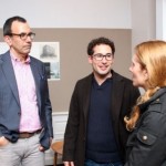 George Perlov speaks with MBA faculty member Jeff Hittner and Ariel Kalishman Walsh MBA '14.