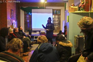Dorthea Thomas educating audience about the roles of policy-making for environmental and climate justice.