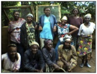 Rural female farmers posing after care-taking for their snail farms provided with the funding from FatPipe